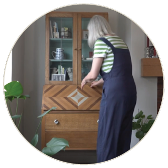 testimonial-stella 2 Customer Stella opens the desk top of her newly refurbished wooden bureau.
