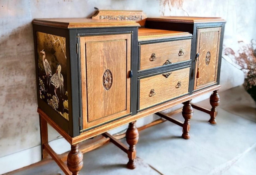 fast-furniture04 Wooden sideboard with hand painted black detailing on the edges of the drawers and a heron wallpaper detail on the end.