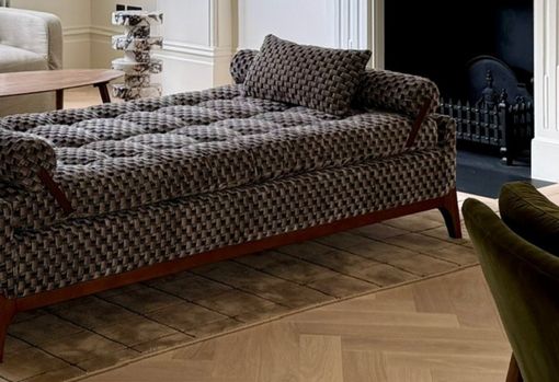 muse-bespoke-04 Close up of an upholstered buttoned day bed in a grey patterned velvet fabric