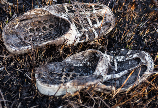 shoes-in-landfill Pile of rubbish in landfill site