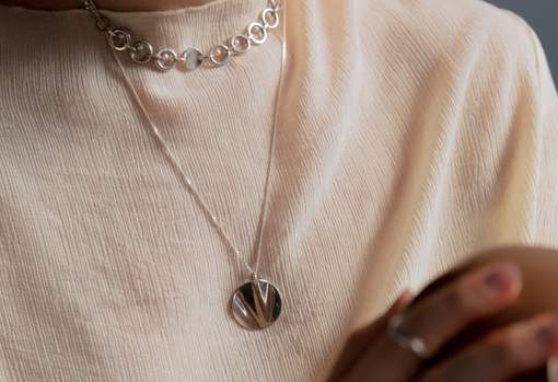 repaired-necklace Woman wearing her repaired necklace given as a gift for valentines
