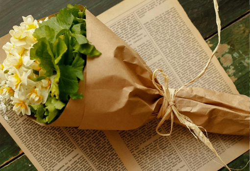 seasonal-flowers A bunch of seasonal hellebores wrapped in brown paper