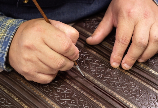 conservation-of-carved-wood Wood restorer expertly restoring and conserving traditional wood-work