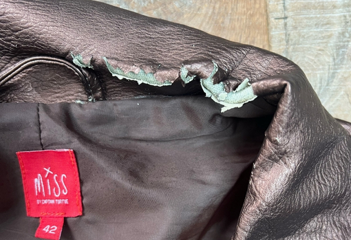 pvc-jacket-collar-damage-09 PVC jacket with badly damaged collar