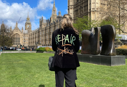 gem-outside-parliament-04 Gem stood outside Parliament wearing a black slogan jacket emblazoned with the words 'Repair don't replace'